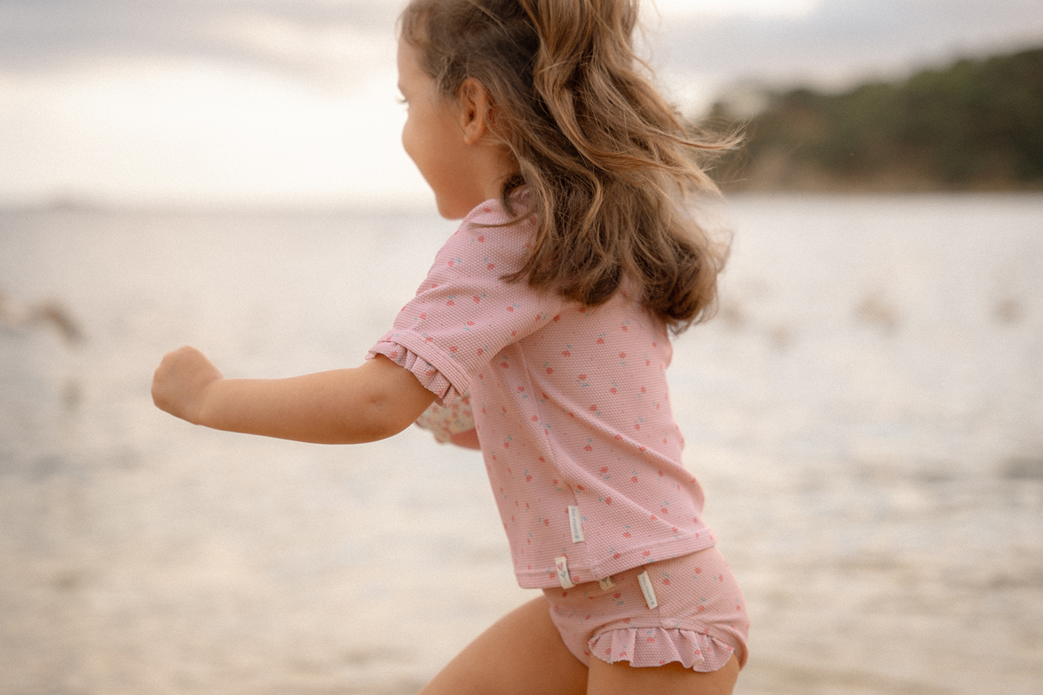 Schwimmshirt mit Rüschen kurzarm - Sunny Flowers Blush (Gr. 86/92)