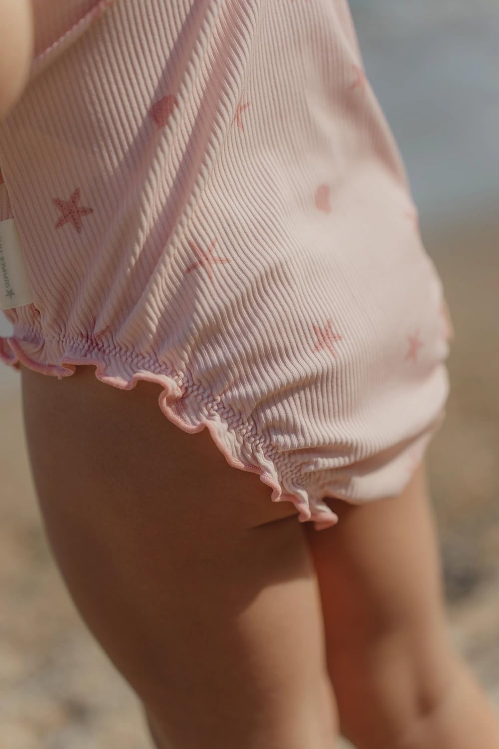 Badeanzug mit Rüschen ärmellos - Dreamy Seashells rosa (Gr. 62/68)