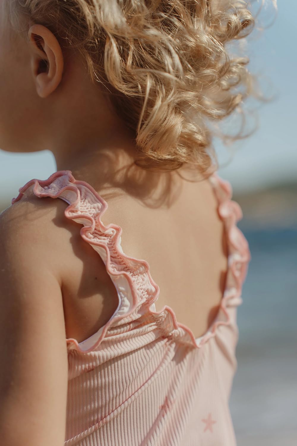 Badeanzug mit Rüschen ärmellos - Dreamy Seashells rosa (Gr. 74/80)