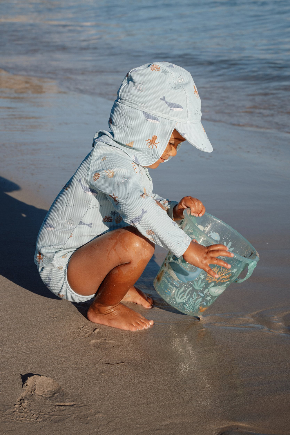 Sonnenhut mit Nackenschutz - Ocean Friends grün (Gr. 0-12 Monate)